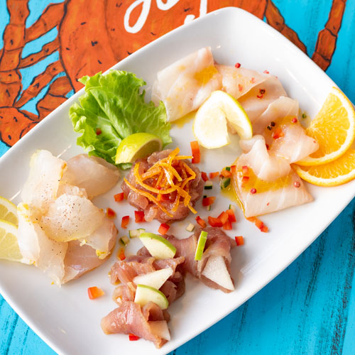 LobStar Enjoyable Seafood Restaurant | Poker of the Ocean Flavors | Tuna Tartare with Lime + Amberjack Carpaccio Marinated in Orange and Pink Pepper + Smoked Tuna Ham + Marinated Sashimi and Pineapple